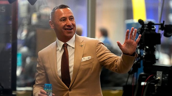 July 15, 2025; Atlanta, GA, USA; Texas head coach Steve Sarkisian waves to fans during SEC Media Days at the College Football Hall of Fame in Atlanta. July 15, 2025; Atlanta, GA, USA; Texas head coach Steve Sarkisian waves to fans during SEC Media Days at the College Football Hall of Fame in Atlanta.