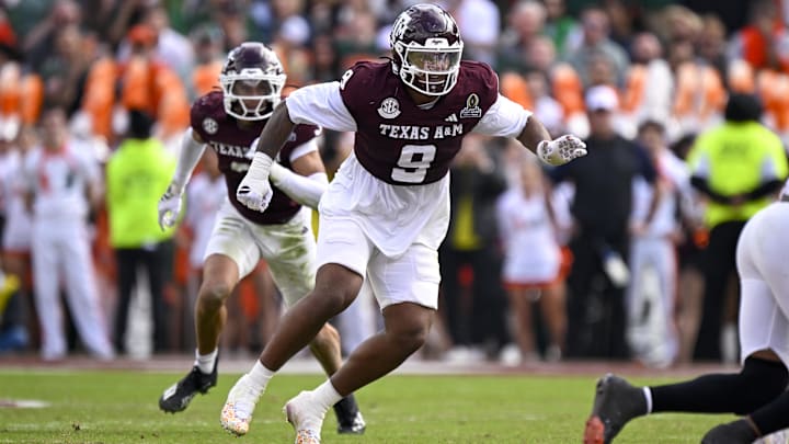Dec 20, 2025; College Station, TX, USA; Texas A&M Aggies defensive end Cashius Howell (9) rushes the line during the game between the Aggies and the Hurricanes at Kyle Field. 