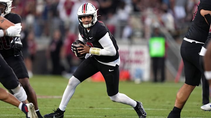 Oct 19, 2024; Stanford, California, USA; Stanford Cardinal quarterback Elijah Brown (2) carries the ball against the Southern Methodist Mustangs during the second quarter at Stanford Stadium. Mandatory Credit: Darren Yamashita-Imagn Images