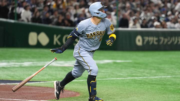Mar 16, 2025; Bunkyo, Tokyo, Japan; Hanshin Tigers third baseman Teruaki Sato (8) runs to first base after hitting a home run against the Los Angeles Dodgers during the fourth inning at Tokyo Dome. Mandatory Credit: Darren Yamashita-Imagn Images Mar 16, 2025; Bunkyo, Tokyo, Japan; Hanshin Tigers third baseman Teruaki Sato (8) runs to first base after hitting a home run against the Los Angeles Dodgers during the fourth inning at Tokyo Dome. Mandatory Credit: Darren Yamashita-Imagn Images