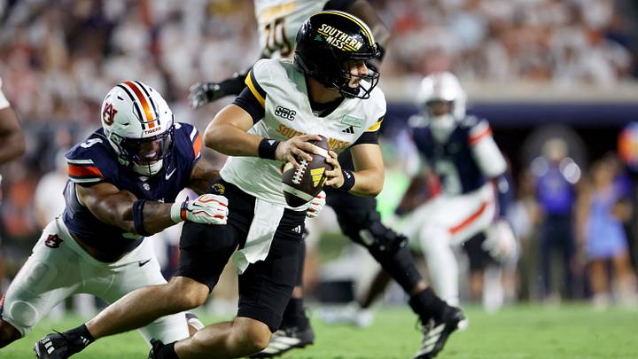 Sep 12, 2026; Auburn, Alabama, USA; Southern Mississippi Golden Eagles defensive back Landon Sylvie (25) tackles Auburn Tigers wide receiver Chas Nimrod (5) during the first quarter at Jordan-Hare Stadium. Mandatory Credit: John Reed-Imagn Images Sep 12, 2026; Auburn, Alabama, USA; Southern Mississippi Golden Eagles defensive back Landon Sylvie (25) tackles Auburn Tigers wide receiver Chas Nimrod (5) during the first quarter at Jordan-Hare Stadium. Mandatory Credit: John Reed-Imagn Images