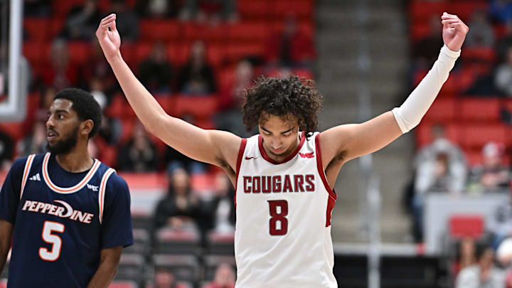 Nate Calmese, playing for WSU and formerly of UW, celebrates an 87-86 win over Pepperdine.