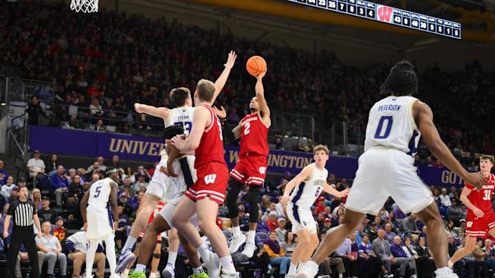 Feb 28, 2026; Seattle, Washington, USA; Wisconsin Badgers guard Nick Boyd (2) shoots the ball against the Washington Huskies during the second half at Alaska Airlines Arena at Hec Edmundson Pavilion.