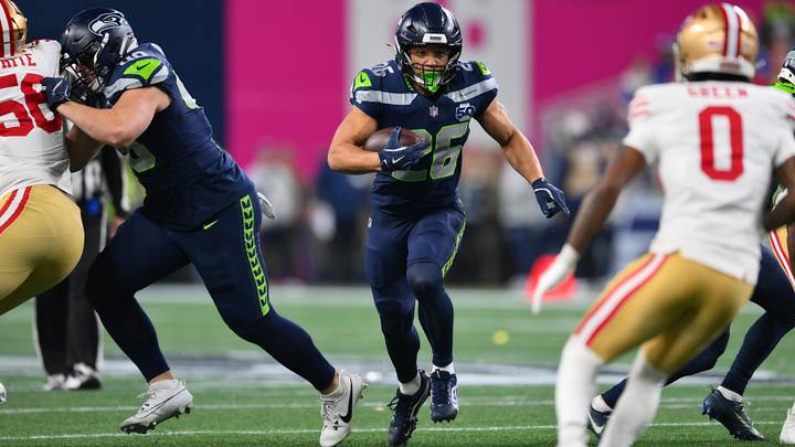 Seattle Seahawks running back Zach Charbonnet (26) carries the ball against the San Francisco 49ers. Seattle Seahawks running back Zach Charbonnet (26) carries the ball against the San Francisco 49ers.