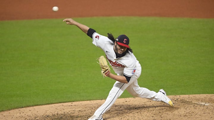 Oct 18, 2024; Cleveland, Ohio, USA; Cleveland Guardians pitcher Eli Morgan (49) pitches against the New York Yankees in the fifth inning during game four of the ALCS for the 2024 MLB playoffs at Progressive Field. Mandatory Credit: David Richard-Imagn Images