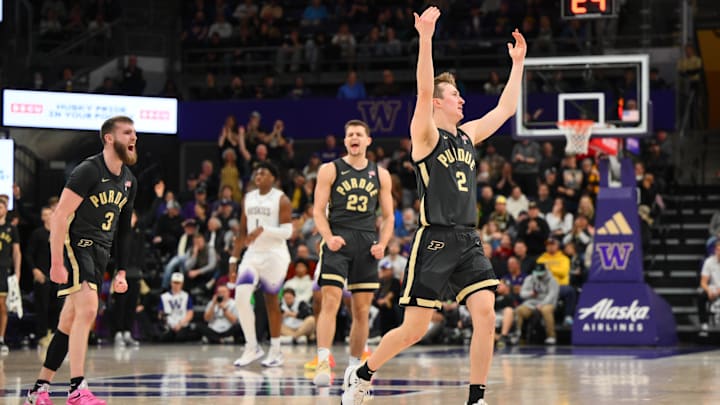 Purdue Boilermakers guard Fletcher Loyer (2) celebrates after making a three-point shot against the Washington Huskies Purdue Boilermakers guard Fletcher Loyer (2) celebrates after making a three-point shot against the Washington Huskies