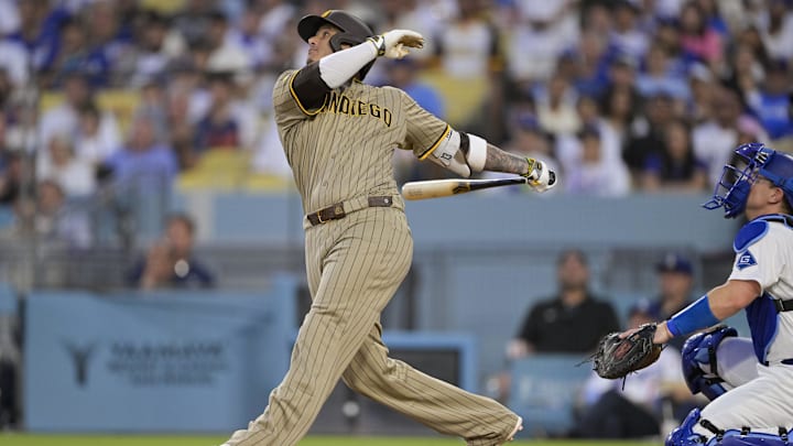Jun 16, 2025; Los Angeles, California, USA; San Diego Padres third baseman Manny Machado (13) pops out during the third inning against the Los Angeles Dodgers at Dodger Stadium. Mandatory Credit: Jayne Kamin-Oncea-Imagn Images