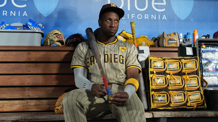 Sep 25, 2024; Los Angeles, California, USA; San Diego Padres left fielder Jurickson Profar (10) watches from the dugout during the game against the Los Angeles Dodgers at Dodger Stadium. Mandatory Credit: Kirby Lee-Imagn Images