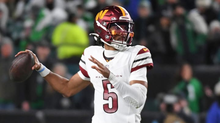 Nov 14, 2024; Philadelphia, Pennsylvania, USA; Washington Commanders quarterback Jayden Daniels (5) throws a pass against the Philadelphia Eagles during the second quarter at Lincoln Financial Field. Mandatory Credit: Eric Hartline-Imagn Images
