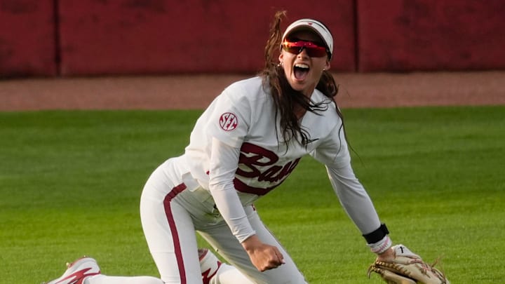 April 2, 2026; Tuscaloosa, AL, USA; Alabama left fielder Lauren Johnson celebrates after making a diving catch at Rhoads Stadium as Number 1 Texas and Number 4 Alabama play an SEC series.