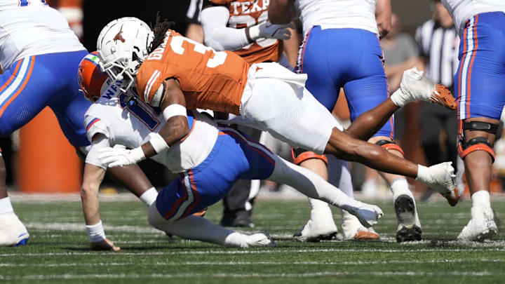 Nov 9, 2024; Austin, Texas, USA; Texas Longhorns defensive back Jaylon Guilbeau (3) sacks Florida Gators Aidan Warner (16) during the first half at Darrell K Royal-Texas Memorial Stadium. Mandatory Credit: Scott Wachter-Imagn Images