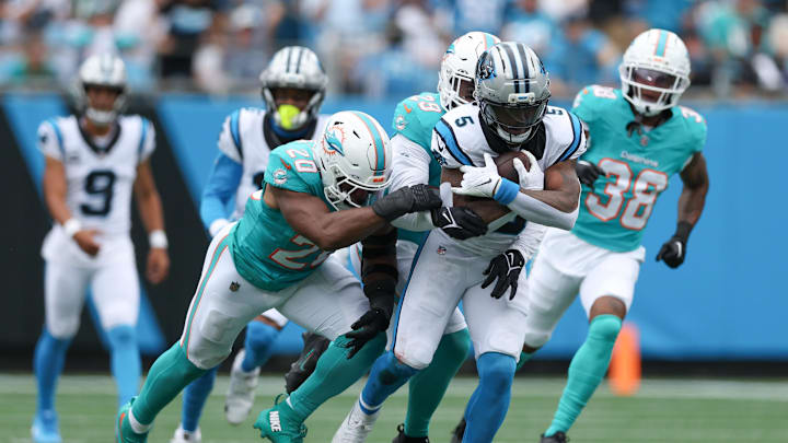Oct 5, 2025; Charlotte, North Carolina, USA; Carolina Panthers running back Rico Dowdle (5) carries the ball during the second quarter against the Miami Dolphins at Bank of America Stadium. Mandatory Credit: Cory Knowlton-Imagn Images Oct 5, 2025; Charlotte, North Carolina, USA; Carolina Panthers running back Rico Dowdle (5) carries the ball during the second quarter against the Miami Dolphins at Bank of America Stadium. Mandatory Credit: Cory Knowlton-Imagn Images