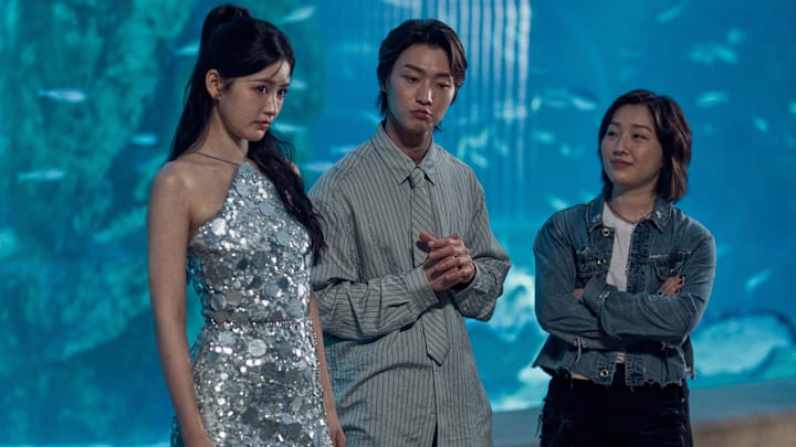 (L to R) Han Bi Ryu as Eunice Kang, Sang Heon Lee as Min Ho Moon, Christine Heesun Hwang as Gigi in episode 303 of XO, Kitty