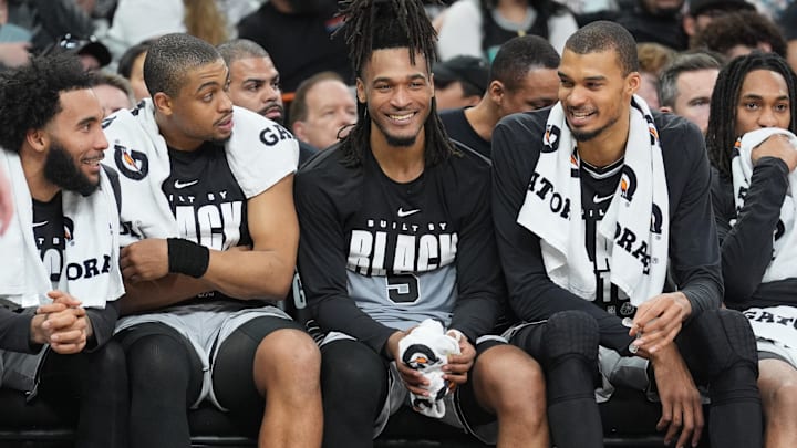 Feb 7, 2026; San Antonio, Texas, USA;  San Antonio Spurs guard Stephon Castle (5) on the bench during the second half against the Dallas Mavericks at Frost Bank Center. Mandatory Credit: Daniel Dunn-Imagn Images