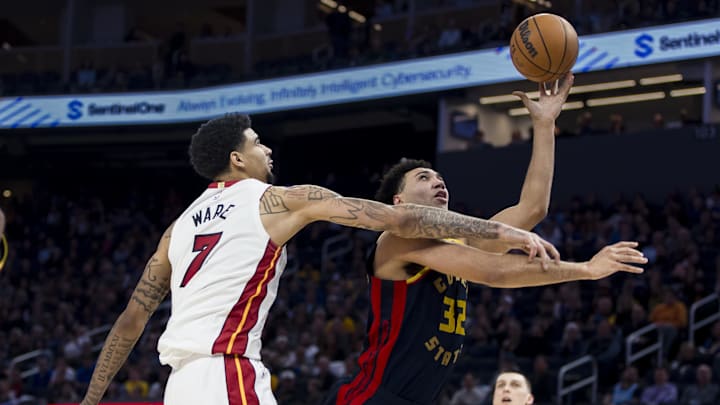 Golden State Warriors forward Trayce Jackson-Davis (32) shoots against Miami Heat center Kel'el Ware (7) at the Chase Center. 