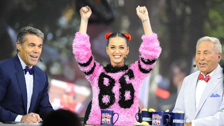Oct 4, 2014; Oxford, MS, USA; Chris Fowler and Katy Perry and Lee Corso of ESPN College Gameday prior to the Mississippi Rebels game against the Alabama Crimson Tide at Vaught-Hemingway Stadium. Mandatory Credit: Christopher Hanewinckel-USA TODAY Sports