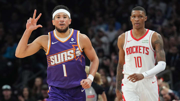 Mar 2, 2024; Phoenix, Arizona, USA; Phoenix Suns guard Devin Booker (1) reacts after making a shot against Houston Rockets forward Jabari Smith Jr. (10) during the first half at Footprint Center. Mandatory Credit: Joe Camporeale-Imagn Images Mar 2, 2024; Phoenix, Arizona, USA; Phoenix Suns guard Devin Booker (1) reacts after making a shot against Houston Rockets forward Jabari Smith Jr. (10) during the first half at Footprint Center. Mandatory Credit: Joe Camporeale-Imagn Images