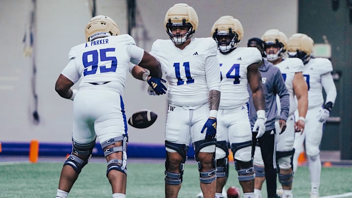 Ta'ita'i Uiagalelei (11) works with Armon Parker in a DL drill. Ta'ita'i Uiagalelei (11) works with Armon Parker in a DL drill.