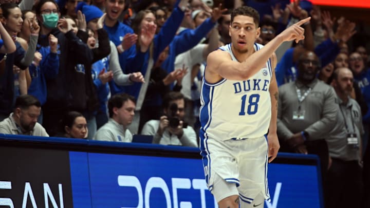Duke Blue Devils forward Mason Gillis (18) reacts after hitting a three-pointer Duke Blue Devils forward Mason Gillis (18) reacts after hitting a three-pointer