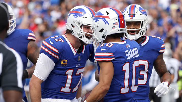 Bills quarterback Josh Allen congratulates receiver Khalil Shakir on his touchdown catch. Bills quarterback Josh Allen congratulates receiver Khalil Shakir on his touchdown catch.