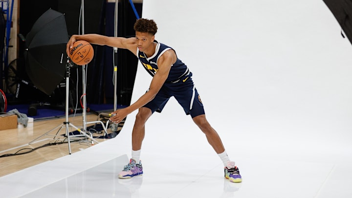 Sep 29, 2025; Denver, CO, USA; Denver Nuggets player Kessler Edwards (20) poses for a picture during media day at Ball Arena. Mandatory Credit: Isaiah J. Downing-Imagn Images