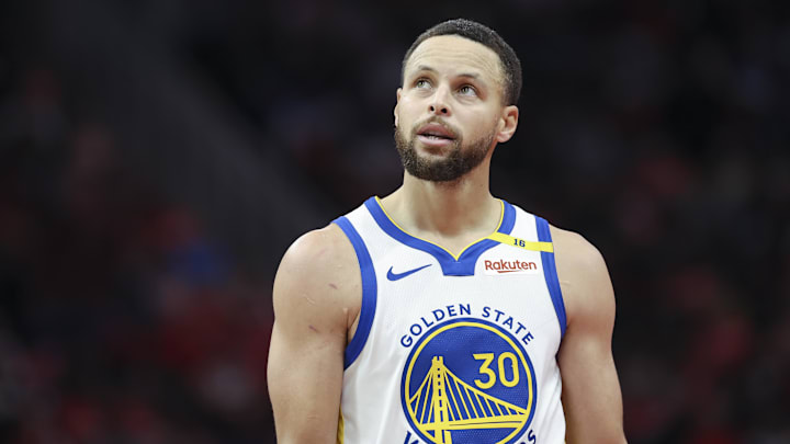 Dec 11, 2024; Houston, Texas, USA; Golden State Warriors guard Stephen Curry (30) looks up after a play during the fourth quarter against the Houston Rockets at Toyota Center. Mandatory Credit: Troy Taormina-Imagn Images