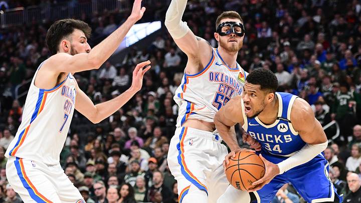 Mar 16, 2025; Milwaukee, Wisconsin, USA; Milwaukee Bucks forward Giannis Antetokounmpo (34) looks for a shot against Oklahoma City Thunder center Chet Holmgren (7) and center Isaiah Hartenstein (55) in the third quarter at Fiserv Forum. Mandatory Credit: Benny Sieu-Imagn Images Mar 16, 2025; Milwaukee, Wisconsin, USA; Milwaukee Bucks forward Giannis Antetokounmpo (34) looks for a shot against Oklahoma City Thunder center Chet Holmgren (7) and center Isaiah Hartenstein (55) in the third quarter at Fiserv Forum. Mandatory Credit: Benny Sieu-Imagn Images
