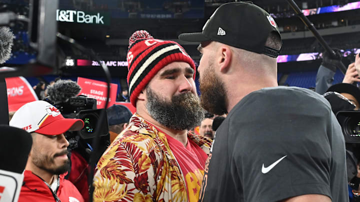 Kansas City Chiefs tight end Travis Kelce (87) celebrates with Jason Kelce (center) after the Kansas City Chiefs won the AFC Championship football game against the Baltimore Ravens.