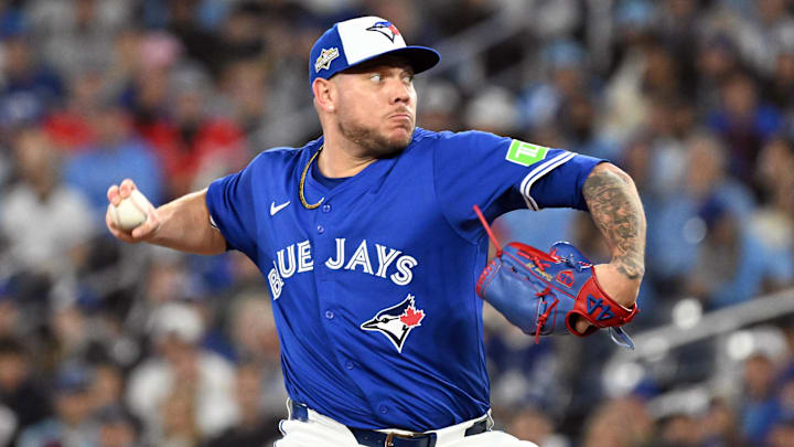 Oct 13, 2025; Toronto, Ontario, CAN; Toronto Blue Jays pitcher Yariel Rodriguez (29) pitches against the Seattle Mariners in the seventh inning during game two of the ALCS round for the 2025 MLB playoffs at Rogers Centre. Mandatory Credit: Dan Hamilton-Imagn Images