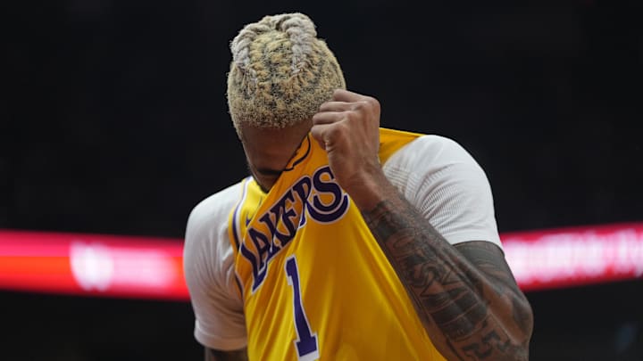 Nov 1, 2024; Toronto, Ontario, CAN; Los Angeles Lakers guard D'Angelo Russell (1) wipes his brow during a break in the action against the Toronto Raptors at Scotiabank Arena. Mandatory Credit: John E. Sokolowski-Imagn Images