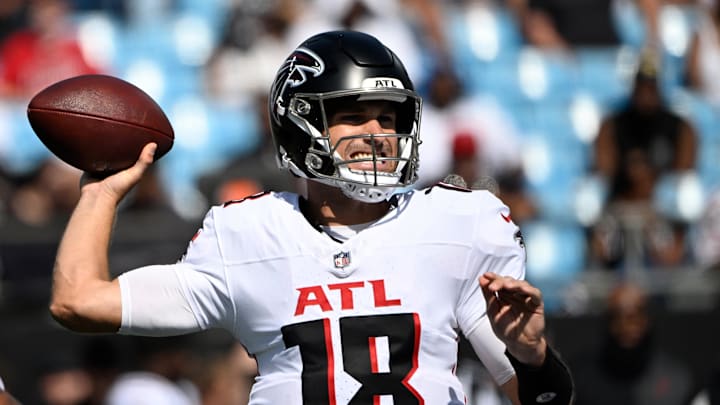 Sep 21, 2025; Charlotte, North Carolina, USA;  Atlanta Falcons quarterback Kirk Cousins (18) looks to pass in the fourth quarter at Bank of America Stadium. 