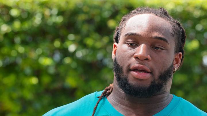 Miami Dolphins defensive tackle Jordan Phillips (94) speaks to reporters after practice at the Baptist Health Training Complex. 