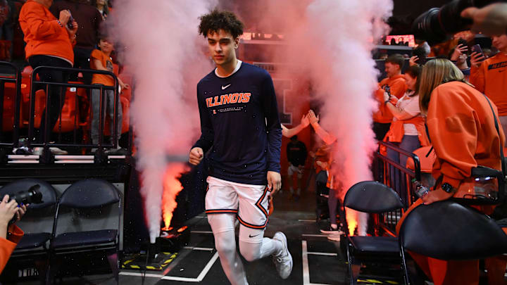 Feb 15, 2026; Champaign, Illinois, USA;  Illinois Fighting Illini guard Keaton Wagler (23) and teammates take the court before the first half against the Indiana Hoosiers at State Farm Center. Mandatory Credit: Ron Johnson-Imagn Images