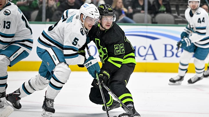 Nov 11, 2022; Dallas, Texas, USA; San Jose Sharks defenseman Matt Benning (5) defends against Dallas Stars right wing Matej Blumel (22) during the second period at American Airlines Center. Mandatory Credit: Jerome Miron-Imagn Images