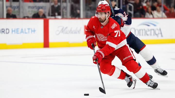Apr 7, 2026; Detroit, Michigan, USA;  Detroit Red Wings center Dylan Larkin (71) skates with the puck in overtime against the Columbus Blue Jackets at Little Caesars Arena. Mandatory Credit: Rick Osentoski-Imagn Images