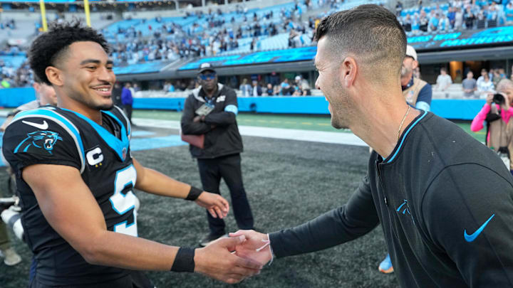 Nov 3, 2024; Charlotte, North Carolina, USA; Carolina Panthers quarterback Bryce Young (9) with head coach Dave Canales after the game at Bank of America Stadium. Mandatory Credit: Bob Donnan-Imagn Images