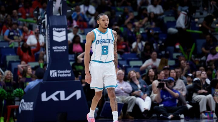 Mar 30, 2025; New Orleans, Louisiana, USA; Charlotte Hornets guard Nick Smith Jr. (8) reacts after making a three-point basket against the New Orleans Pelicans during the second half at Smoothie King Center. Mandatory Credit: Matthew Hinton-Imagn Images