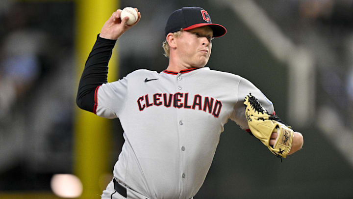 Aug 24, 2025; Arlington, Texas, USA; Cleveland Guardians relief pitcher Nic Enright (59) pitches against the Texas Rangers during the game at Globe Life Field. Mandatory Credit: Jerome Miron-Imagn Images