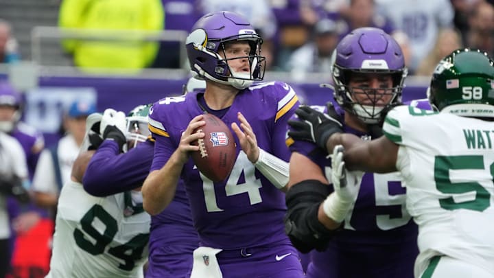 Minnesota Vikings quarterback Sam Darnold (14) throws the ball against the New York Jets in the first half at Tottenham Hotspur Stadium in London on Oct. 6, 2024. 