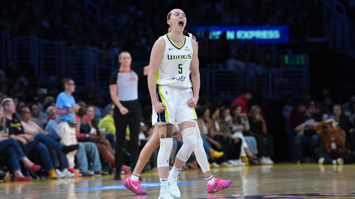 Aug 20, 2025; Los Angeles, California, USA; Dallas Wings guard Paige Bueckers (5) celebrates in the second half against the LA Sparks at Crypto.com Arena. Mandatory Credit: Kirby Lee-Imagn Images