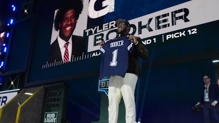 Alabama offensive lineman Tyler Booker is selected by the Dallas Cowboys as the No. 12 pick in the first round of the 2025 NFL Draft. Alabama offensive lineman Tyler Booker is selected by the Dallas Cowboys as the No. 12 pick in the first round of the 2025 NFL Draft.