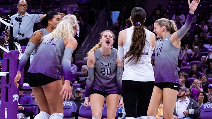 TCU Volleyball players celebrate during their win over West Virginia.