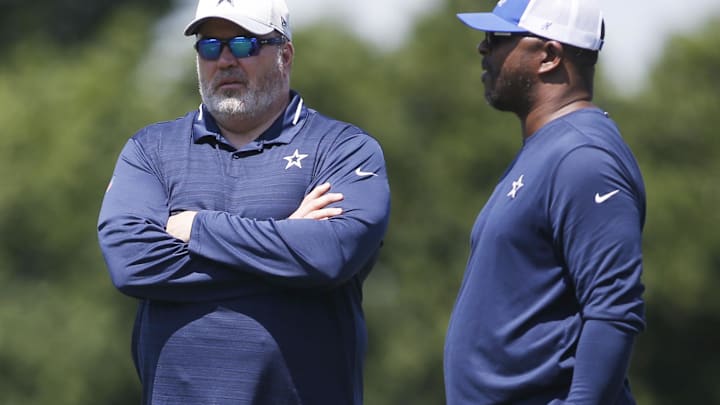 May 14, 2022; Frisco, Texas, USA; Dallas Cowboys head coach Mike McCarthy (L) talks with vice