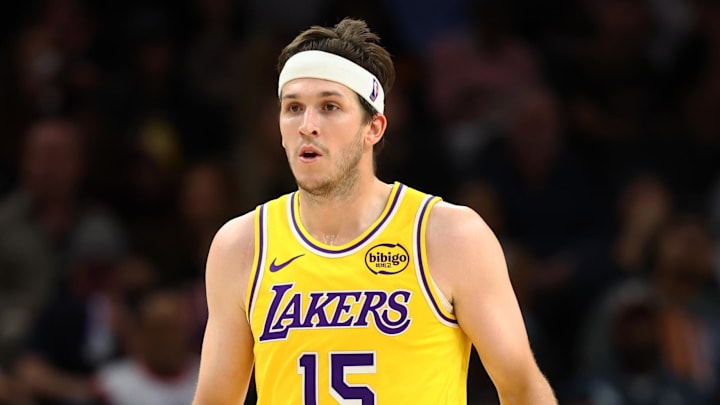 Dec 23, 2025; Phoenix, Arizona, USA; Los Angeles Lakers guard Austin Reaves (15) against the Phoenix Suns at Mortgage Matchup Center. Mandatory Credit: Mark J. Rebilas-Imagn Images