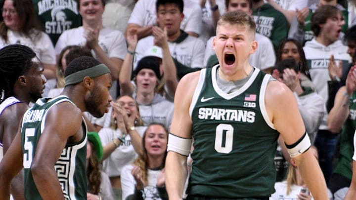 Nov 7, 2024; East Lansing, Michigan, USA; Michigan State Spartans forward Jaxon Kohler (0) shouts after making a basket and drawing a foul from Niagra during the first half at Jack Breslin Student Events Center. Mandatory Credit: Dale Young-Imagn Images Nov 7, 2024; East Lansing, Michigan, USA; Michigan State Spartans forward Jaxon Kohler (0) shouts after making a basket and drawing a foul from Niagra during the first half at Jack Breslin Student Events Center. Mandatory Credit: Dale Young-Imagn Images