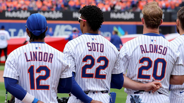 Apr 4, 2025; New York City, New York, USA; New York Mets shortstop Francisco Lindor (12) and right fielder Juan Soto (22) and first baseman Pete Alonso (20) and left fielder Brandon Nimmo (9) stand for the national anthem before the Mets home opener against the Toronto Blue Jays at Citi Field. Mandatory Credit: Brad Penner-Imagn Images