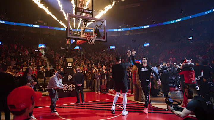 Jan 11, 2025; Portland, Oregon, USA; Portland Trail Blazers forward Deni Avdija (8) high-fives forward Toumani Camara (33) during introductions before a game against the Miami Heat at Moda Center. Mandatory Credit: Troy Wayrynen-Imagn Images Jan 11, 2025; Portland, Oregon, USA; Portland Trail Blazers forward Deni Avdija (8) high-fives forward Toumani Camara (33) during introductions before a game against the Miami Heat at Moda Center. Mandatory Credit: Troy Wayrynen-Imagn Images