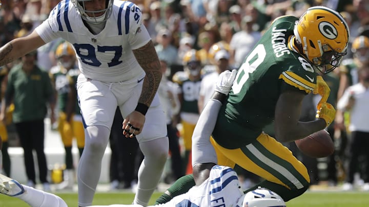 Green Bay Packers running back Josh Jacobs fumbles near the goal line against the Colts.