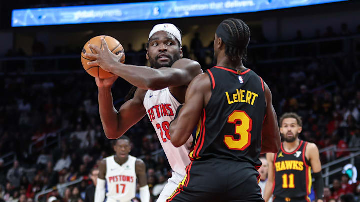 Feb 23, 2025; Atlanta, Georgia, USA; Atlanta Hawks guard Caris LeVert (3) plays defense against Detroit Pistons center Isaiah Stewart (28) during the first quarter at State Farm Arena. Mandatory Credit: Jordan Godfree-Imagn Images