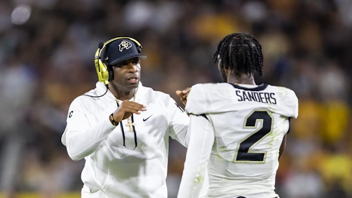 Oct 7, 2023; Tempe, Arizona, USA; Colorado Buffaloes head coach Deion Sanders with son and